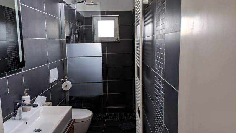 Private bathroom with walk-in shower